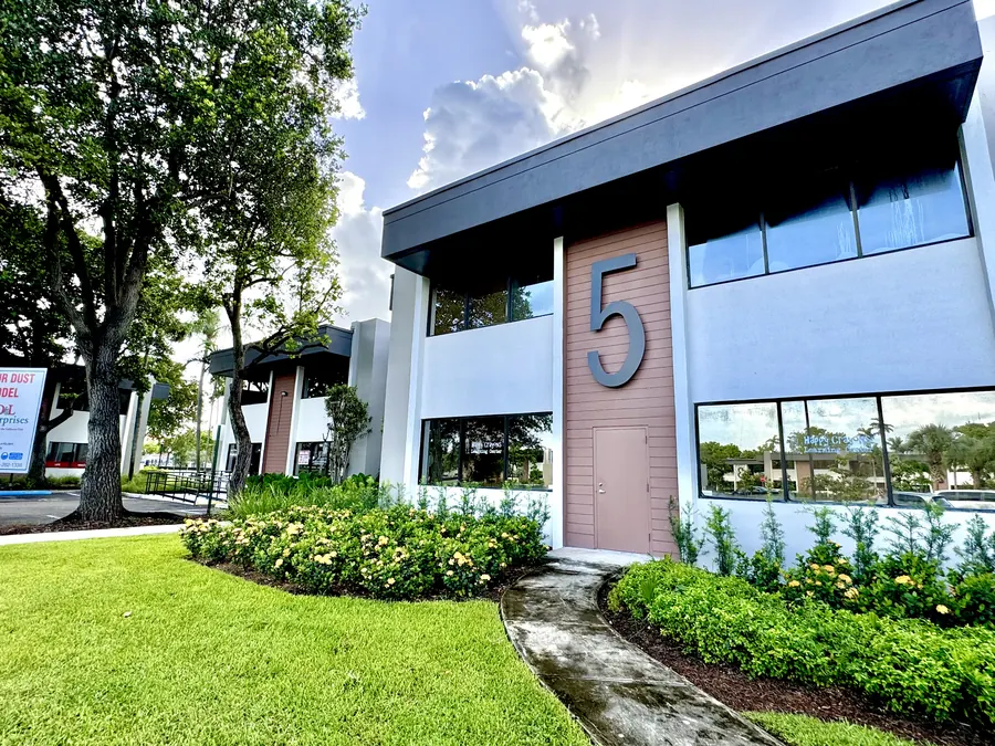 Exterior of Building 5 with manicured garden beds