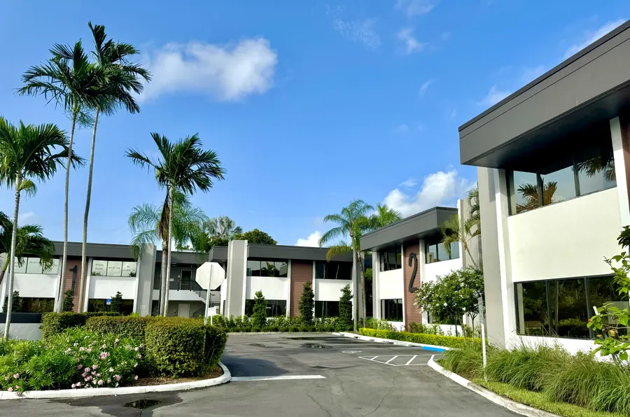 Palm-lined entry drive at the office park